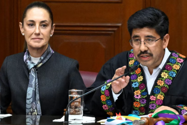 Hugo Aguilar Ortiz, ministro presidente de la Corte, y Claudia Sheinbaum. 