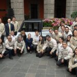Claudia Sheinbaum al centro durante un acto público en Palacio Nacional