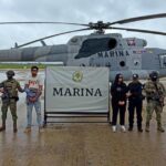 Carlos N y Ana Gabriela N, con identidades protegidas, junto a personal naval tras la detención reportada en Tuxtepec.